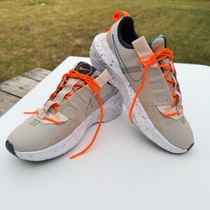 Nike Crater Impact Woman’s Tan Sneakers with Vibrant Orange Laces